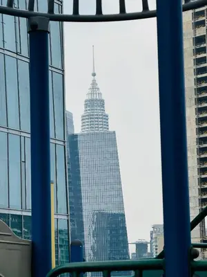 a view of a tall building from a window at Dorsett Infinity Pool KL in Kuala Lumpur