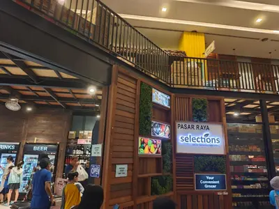 a store with people walking inside of a shopping mall at 12mins walk to KLCC in Kuala Lumpur