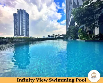 an infinity view swimming pool between two buildings at Trion Kuala Lumpur Near Sunway Velocity KLCC TRX Bukit Bintang in Kuala Lumpur