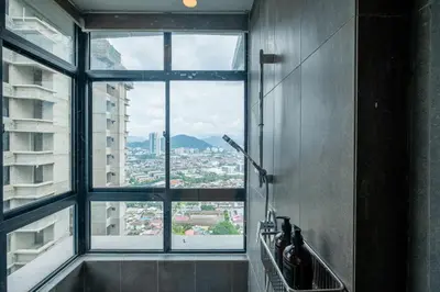 a room with a window with a view of a city at Premium Classy 4Room@Astoria Ampang 12pax 6km KLCC in Kuala Lumpur