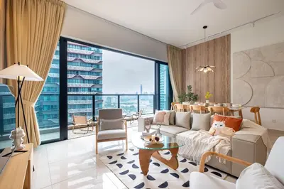 a living room with a couch and a table at Premium Classy 4Room@Astoria Ampang 12pax 6km KLCC in Kuala Lumpur