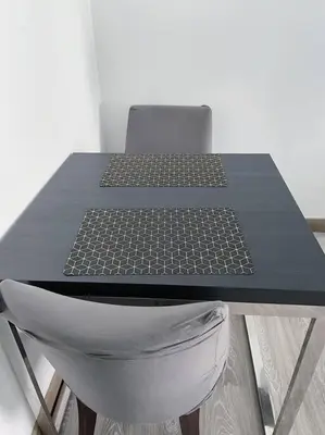 a black table with a laptop on top of it at Premium Stay at Bukit Bintang City Centre by Premium Stay in Kuala Lumpur