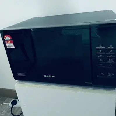 a microwave oven sitting on top of a counter at Premium Stay at Bukit Bintang City Centre by Premium Stay in Kuala Lumpur