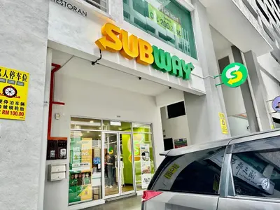 a superdrug store with a car parked outside of it at Razak City Residences, Sungai Besi by Rverse Suite in Kuala Lumpur