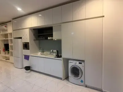 a kitchen with a washer and a washing machine at The Platinum KLCC by Skyline in Kuala Lumpur