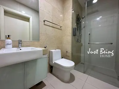 a bathroom with a toilet and a sink and a shower at Just Being Home 5pax 1BR/1BA 1Queen/1Single/1Sofa in Kuala Lumpur