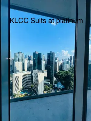 a view of a city skyline from an office window at KLCC Suites at Platinum in Kuala Lumpur
