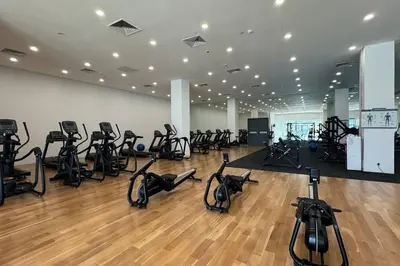 a gym with a bunch of exercise bikes in a room at D'Rapport Residence KL by manatidur in Kuala Lumpur