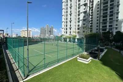 a tennis court in the middle of a city at D'Rapport Residence KL by manatidur in Kuala Lumpur