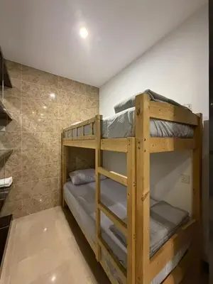 a couple of bunk beds in a room at Dorsett Bukit Bintang in Kuala Lumpur