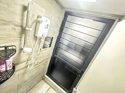 a shower door with a window in a bathroom at Simple Arte Mont Kiara 1B1B 4 Pax Mitec Matrade in Kuala Lumpur