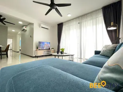 a bedroom with a blue bed and a ceiling fan at Balcony KLCC View Kampung Baru Luxurious in Kuala Lumpur