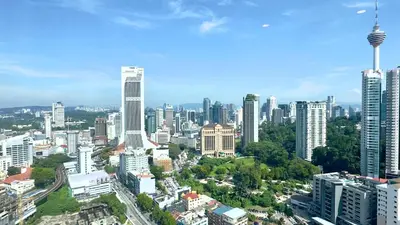 a view of a city with tall buildings at Balcony Unit II & The Robertson Residence 33f in Kuala Lumpur