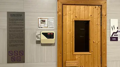 a wall with a pay phone on a wall at Balcony Unit II & The Robertson Residence 33f in Kuala Lumpur