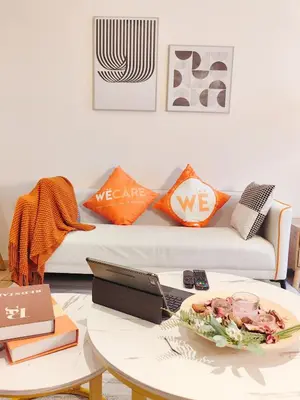 a living room with a couch and a table at The Ovation - Bangsar Trade Centre in Kuala Lumpur