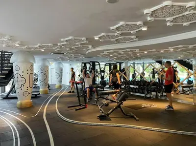a gym on a cruise ship with people exercising in it at Arte Mont Kiara_Publika_Solaris in Kuala Lumpur