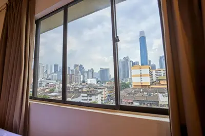 a window in a room with a view of a city at Hotel Bintang Kuala Lumpur in Kuala Lumpur