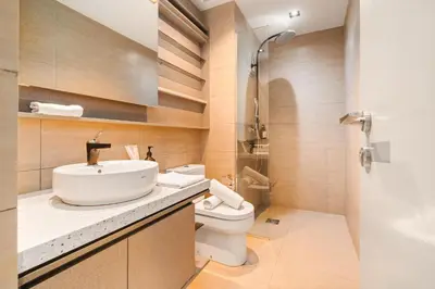 a bathroom with a sink and a toilet at Expressionz Kuala Lumpur in Kuala Lumpur
