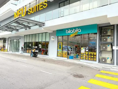 a store front of a music store on a street at Neu Suites By Serenity Homes Near Gleneagles, KLCC & LRT in Kuala Lumpur
