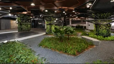 a room with plants and trees in a building at The Home by Fidi @ Continew Residence (Near TREC) in Kuala Lumpur