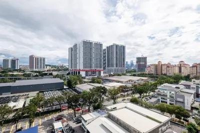 an aerial view of a city with tall buildings at RetroJazz Kids House 15pax 4Room in Kuala Lumpur