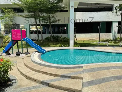 a swimming pool with a slide in front of a building at 3BR 5-6Pax Zetapark Setapak Central Near Zoo in Kuala Lumpur