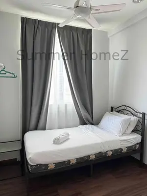 a bed with a ceiling fan and a window at 3BR 5-6Pax Zetapark Setapak Central Near Zoo in Kuala Lumpur