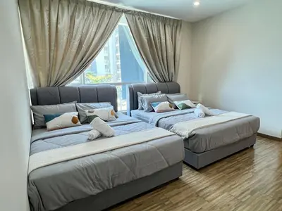 two beds in a room with a window at 30 OFF Monthly l 4Pax Designer Suite by CITYSPACE in Kuala Lumpur