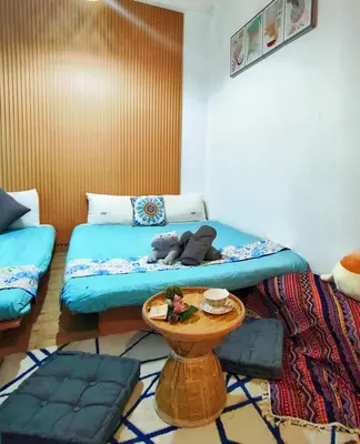 a room with a bed and a table in it at CL24B 2-3pax KLCC Apartment in Kuala Lumpur