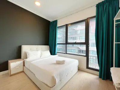 a bedroom with a bed and a large window at Arte plus by 3BR sweet home in Kuala Lumpur