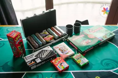 a table with a box of food and other snacks at 40P, Bangsar Villa with Pool/Karaoke/Gathering/BBQ in Kuala Lumpur