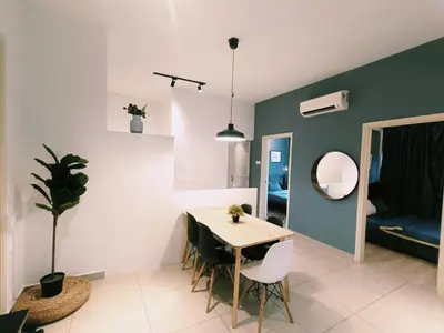 a dining room with a table and chairs at Arte Plus by Stay Relax in Kuala Lumpur