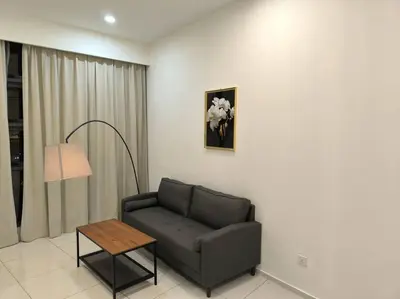 a living room with a couch and a table at 043 Sweet Home Robertson in Kuala Lumpur