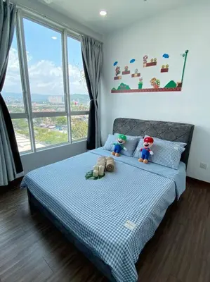 a bedroom with a bed with two dolls on it at SuperMCozy@Setapak Central Mall 10Pax 3BR 2CarPark in Kuala Lumpur