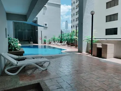 a swimming pool in the middle of a building at 9 Bukit Bintang 5 minutes to Alor Street Seri Bukit Ceylon 2R2B 8 pax in Kuala Lumpur