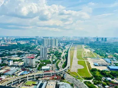 an aerial view of a city with tall buildings at Skystays360 KL, 60th floor - close to KLCC TRX 2-bedroom 2 bathrooms in Kuala Lumpur
