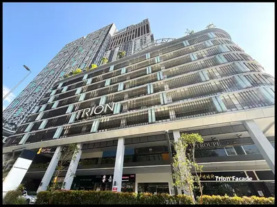 a front view of a hotel building with a sign on it at Skystays360 KL, 60th floor - close to KLCC TRX 2-bedroom 2 bathrooms in Kuala Lumpur