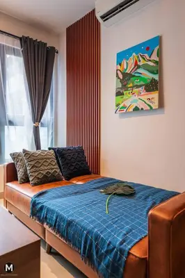 a bedroom with a bed with a blue blanket at 10 Mins to KL City - Modern Suite 6 Pax M Vertica in Kuala Lumpur