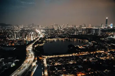 an aerial view of a city at night at M CITY Near KLCC KPJ Puteri Specialist Hospital in Kuala Lumpur