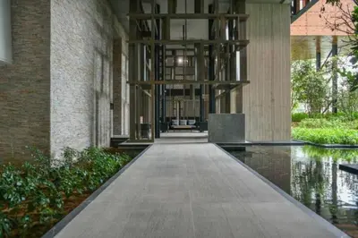a hallway of a building with a walkway at Maxhome Premium at Lucentia Bukit Bintang City Centre KL in Kuala Lumpur