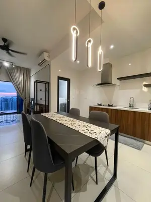 a kitchen and dining room with a table and chairs at Reizz Residence By Sweet Home in Kuala Lumpur