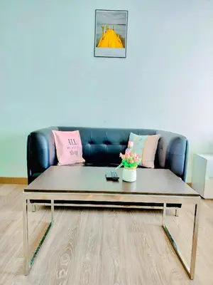 a living room with a couch and a coffee table at Lila House One Bukit Ceylon in Kuala Lumpur
