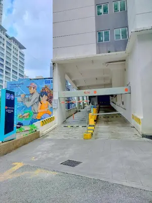 an empty parking lot in front of a building at Lila House One Bukit Ceylon in Kuala Lumpur