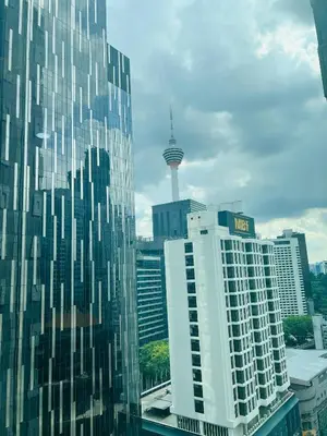 a view of a city with a view of the space needle at Soho Suites KLCC by Comfort Suites Kuala Lumpur in Kuala Lumpur
