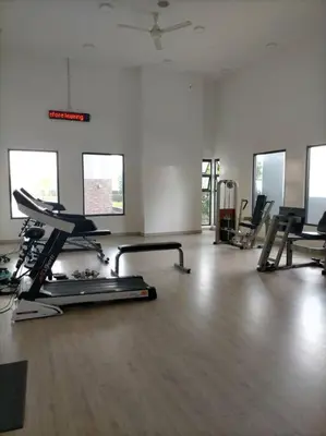 a gym with several exercise bikes and a treadmill at KL2-4pax studio nr KTM&Midvalley in Kuala Lumpur