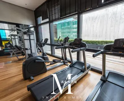 a gym with several cardio machines in a room at Arcoris Mont Kiara 2# Sunway 163# 2-Bedroom with balcony 2-4Pax in Kuala Lumpur