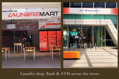 a store with tables and chairs in front of a building at Stunning Pool & the City - 1 mrt stop to TRX in Kuala Lumpur
