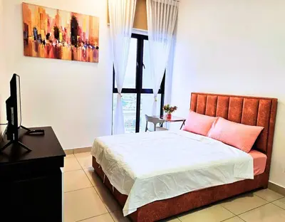 a bedroom with a bed and a tv and a window at Stunning Pool & the City Studio- 1 Mrt stop to TRX in Kuala Lumpur