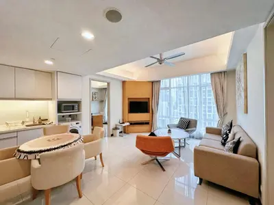 a living room with a couch and a table at Lot163 By ZenGlo in Kuala Lumpur