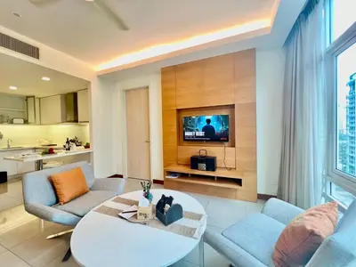 a living room with a couch and a table at Lot163 By ZenGlo in Kuala Lumpur
